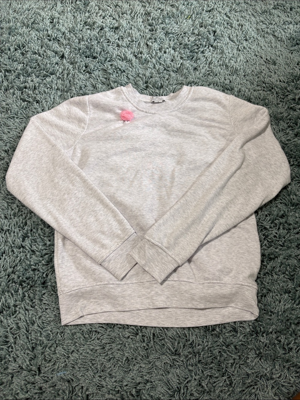 Light Gray Crewneck Women's Sweater with Pink Pom Accent
